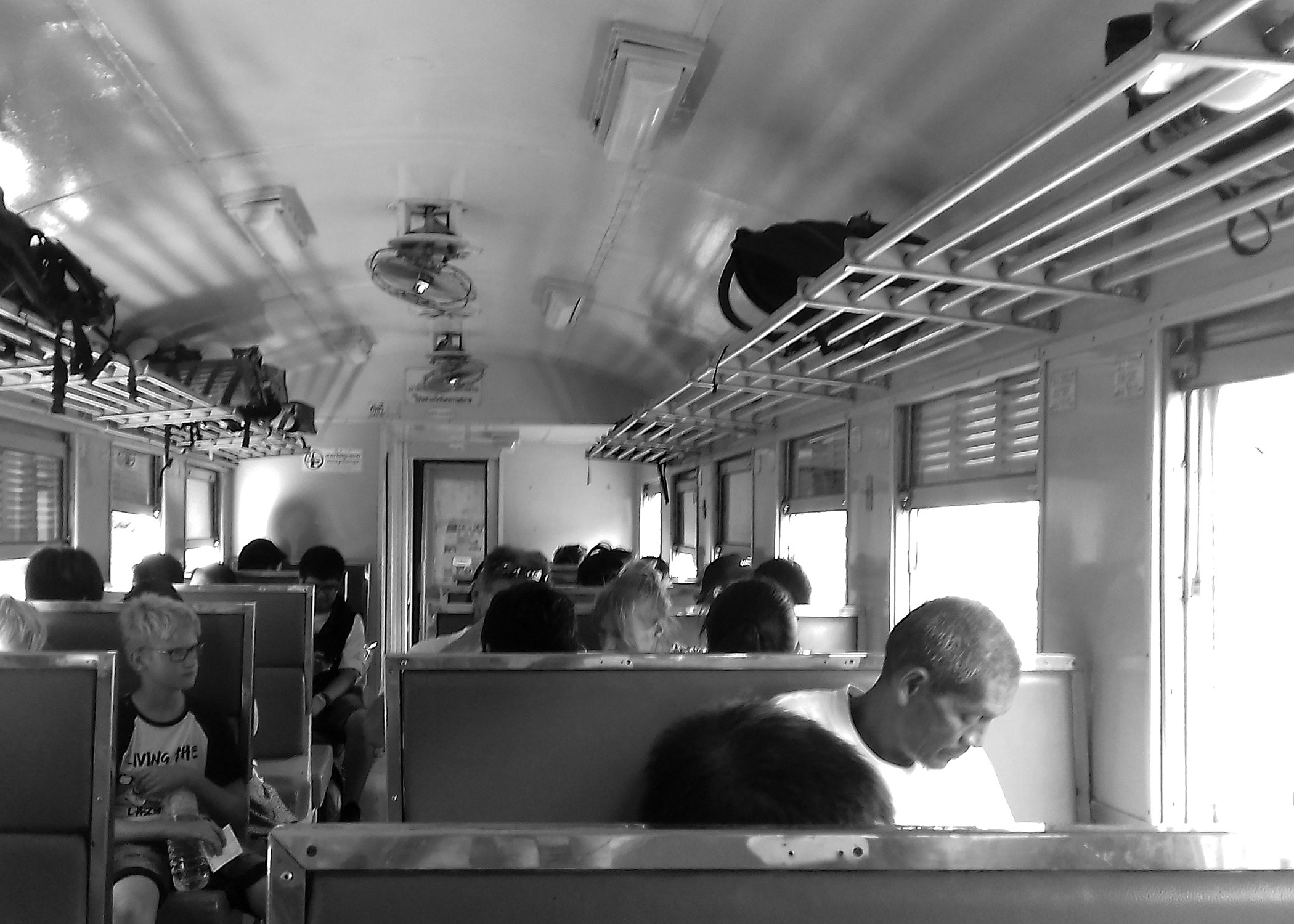 Image of the inside of an open-air train