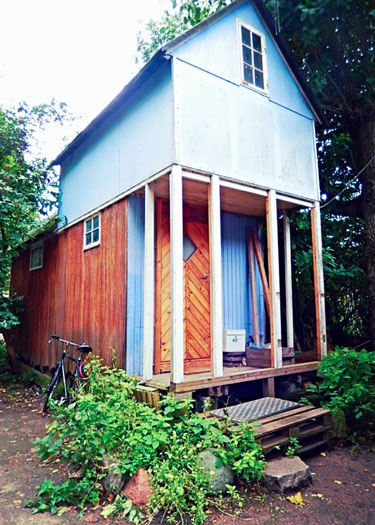 Image of a quirky blue timber house